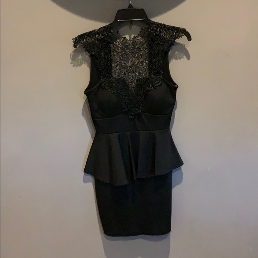 Peplum black dress with lace neckline